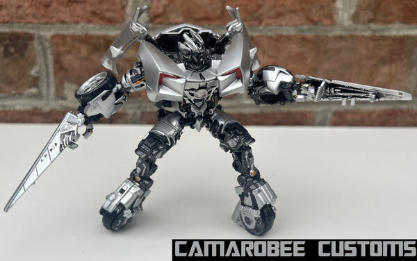DOTM Swipe bot swords.jpg