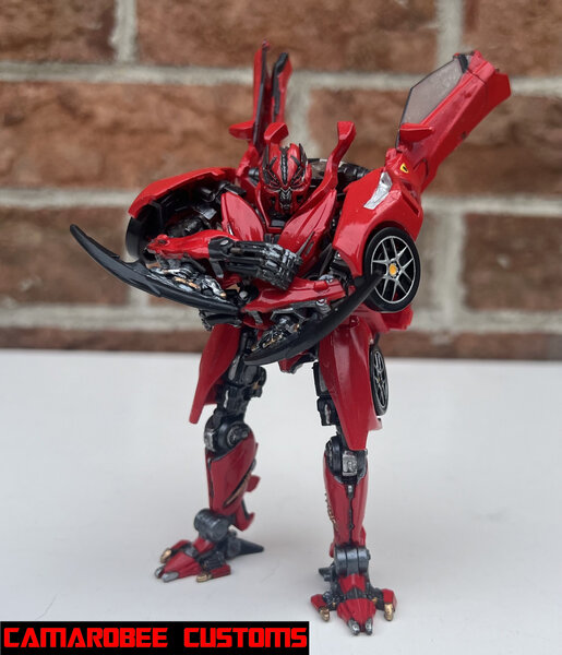 Dino bot arms crossed.jpg