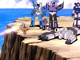 The Decepticons stand on a cliff
