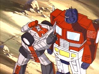 Red Alert pulling on Prime's arm