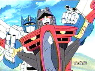 Optimus Prime holds onto Starscream