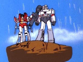 Megatron and Starscream standing on rock