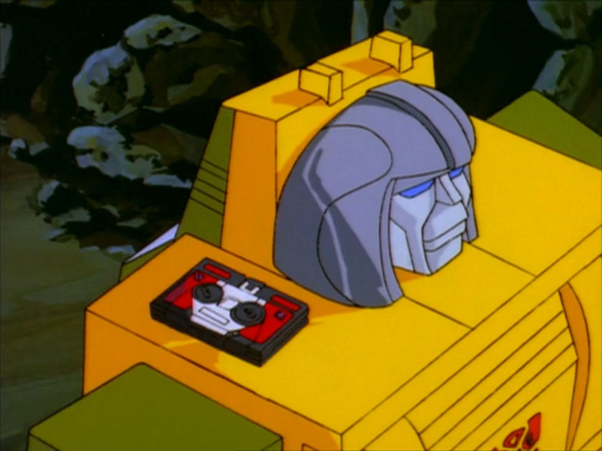 Brawn with Laserbeak on his shoulder
