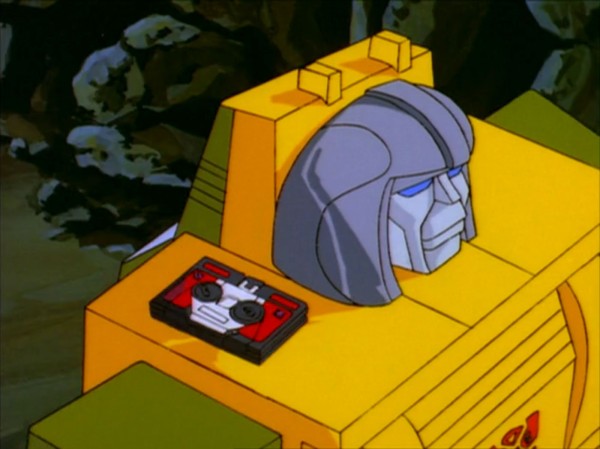 Brawn with Laserbeak on his shoulder