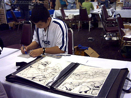 BotCon 2004: Dreamwave Crew - Transformers Event: Don Figueroa drawing Transformers by request and signing autographs (06/19/2004)