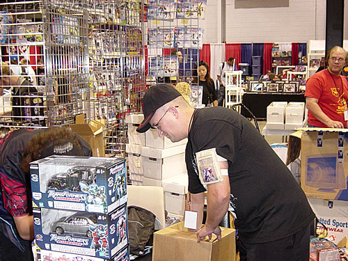 OTFCC 2004: Day 3: Sunday - Transformers Event: Mr. Optimus Prime gets read to pull out the name of the winner of the raffle