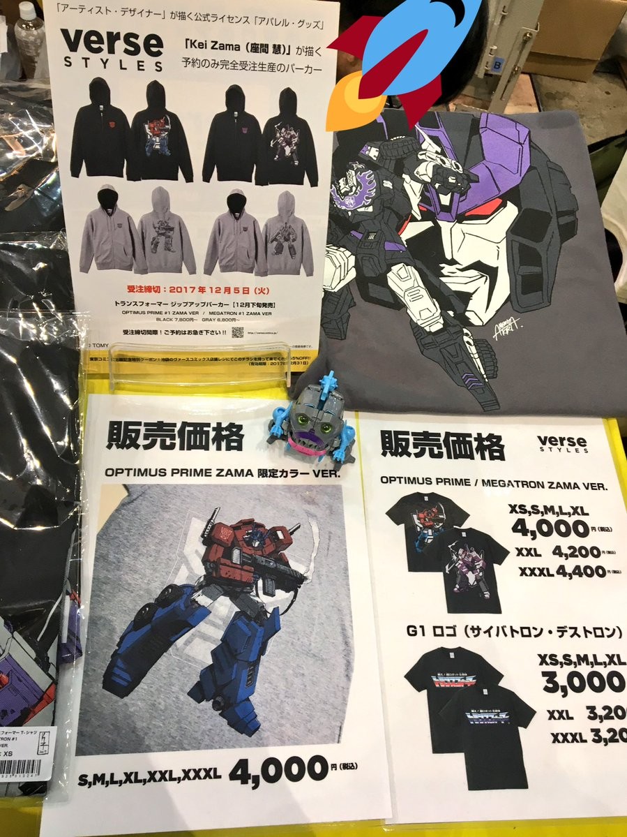 Transformers News: Verse Styles T-Shirts on Display at Tokyo Comic Con, Featuring Optimus Prime, Megatron, Shattered Transformers News: Verse Styles T-Shirts on Display at Tokyo Comic Con, Featuring Optimus Prime, Megatron, Shattered