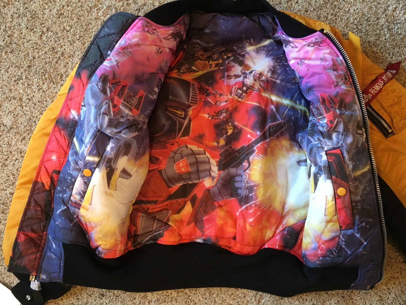 Transformers News: In hand images of Hasbro X Alpha Transformers MA-1 jacket