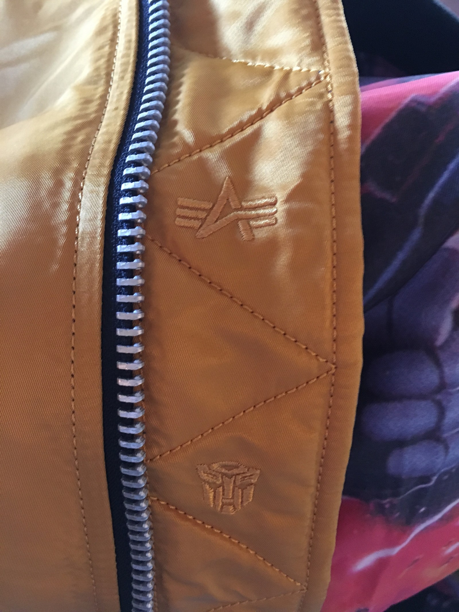 Transformers News: In hand images of Hasbro X Alpha Transformers MA-1 jacket