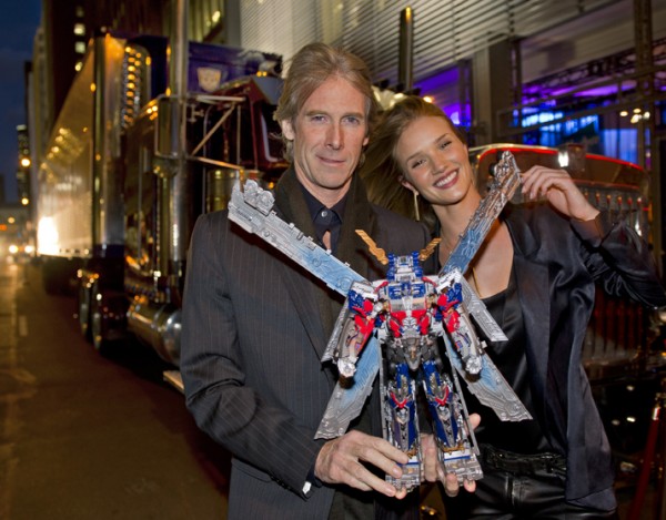 Michael Bay & Rosie Huntington-Whiteley at Toy Fair with Ultimate Optimus Prime