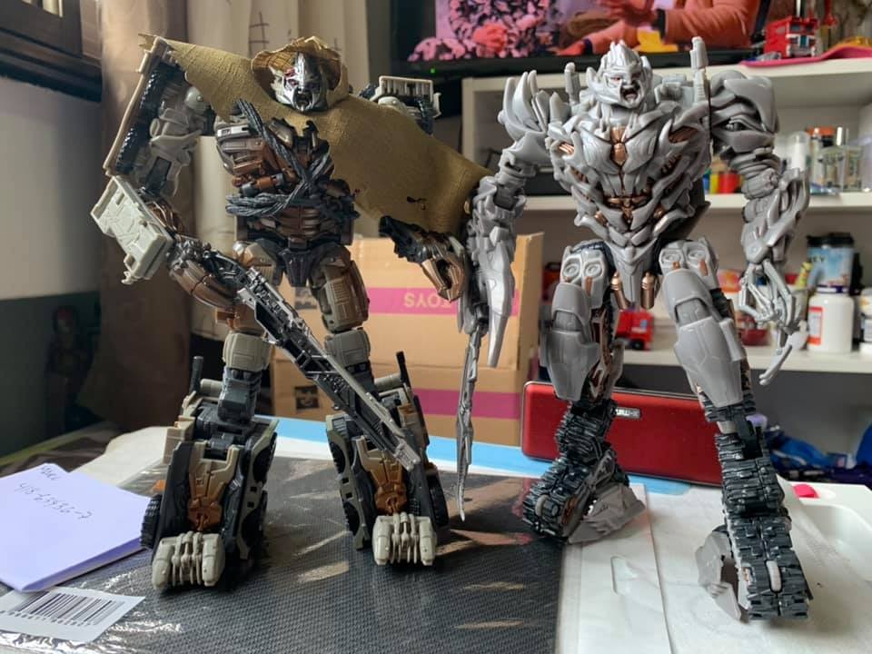 Comparison Image Between Studio Series Leader Megatron and Voyager Megatron