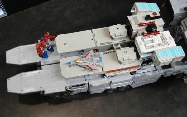 Another Transformers Generations Titan Class Metroplex Size Comparison Teaser