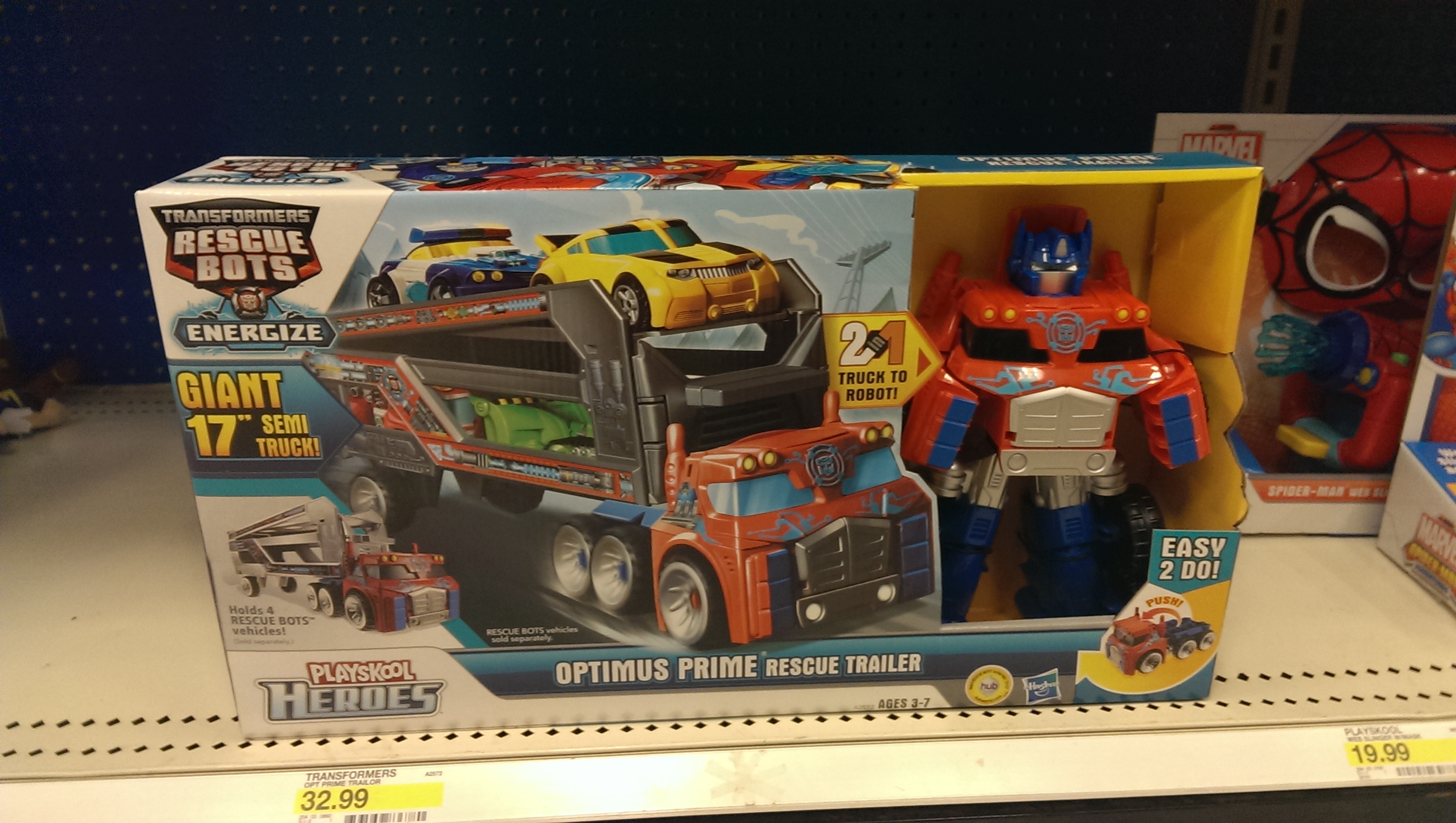 Transformers: Rescue Bots Optimus Prime Rescue Trailer and Flip Changers at Retail