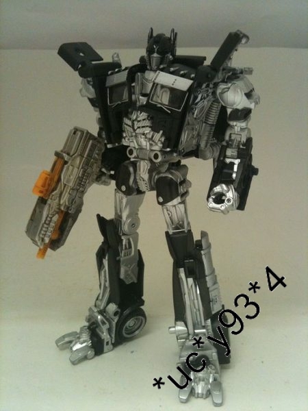 More Images of Milk Exclusive DOTM Deluxe Class Optimus Prime Black Version