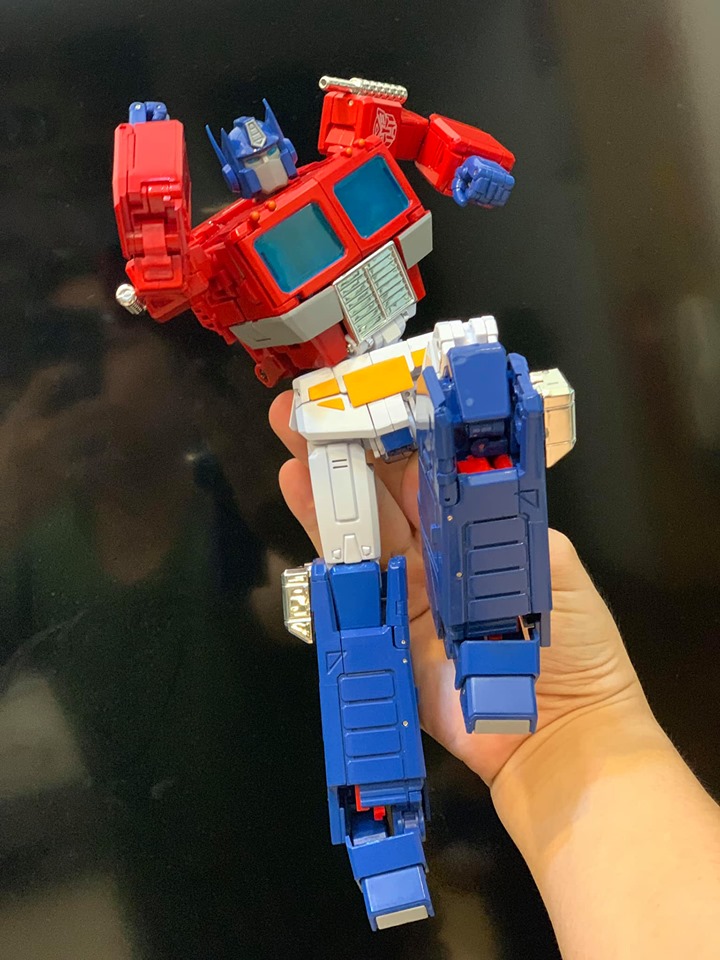 Transformers MP44 Optimus Prime In Hand Images Showing Accessories, Articulation, Collector Pin