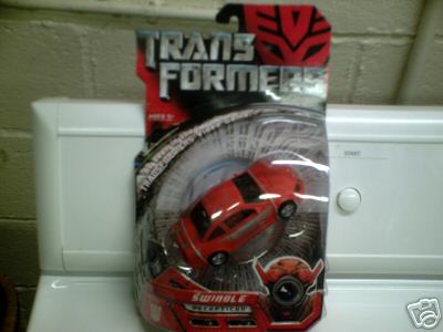 Transformers News: First Look at Transformers Movie Swindle and Bonecrusher Figures