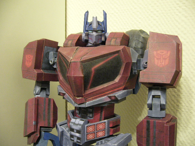 Transformers News: Detailed And Articulated WFC Optimus Papercraft Figure Transformers News: Detailed And Articulated WFC Optimus Papercraft Figure