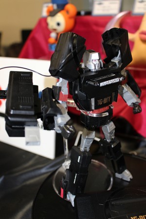 Transformers News: New pictures of Megadrive Megatron and Playstation Optimus Prime