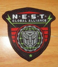 Transformers News: N.E.S.T. Global Alliance Iron On Clothing Patch