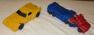 Transformers News: In hand Images of Robots in Disguise Titan Changers Optimus and Bumblebee and Super Bumblebee