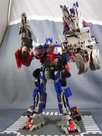 Transformers News: Transformers DSM DA-28 Striker Optimus Prime In-Hand Images