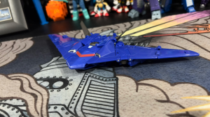 Transformers News: In Hand Images of Transformers Earthspark Soundwave Show an Impressive Alt Mode Wingspan