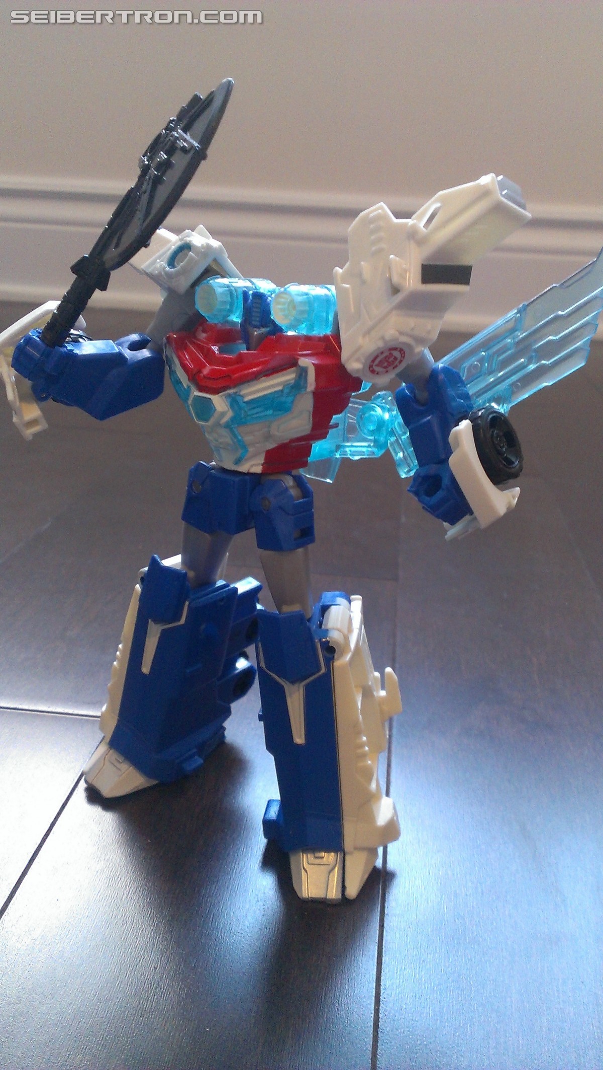 Transformers News: In Hand Pictures of TRU Exclusive White Redeco of Transformers RID Power Surge Optimus Prime Warrior