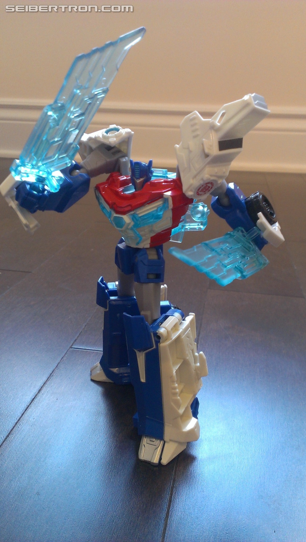 Transformers News: In Hand Pictures of TRU Exclusive White Redeco of Transformers RID Power Surge Optimus Prime Warrior