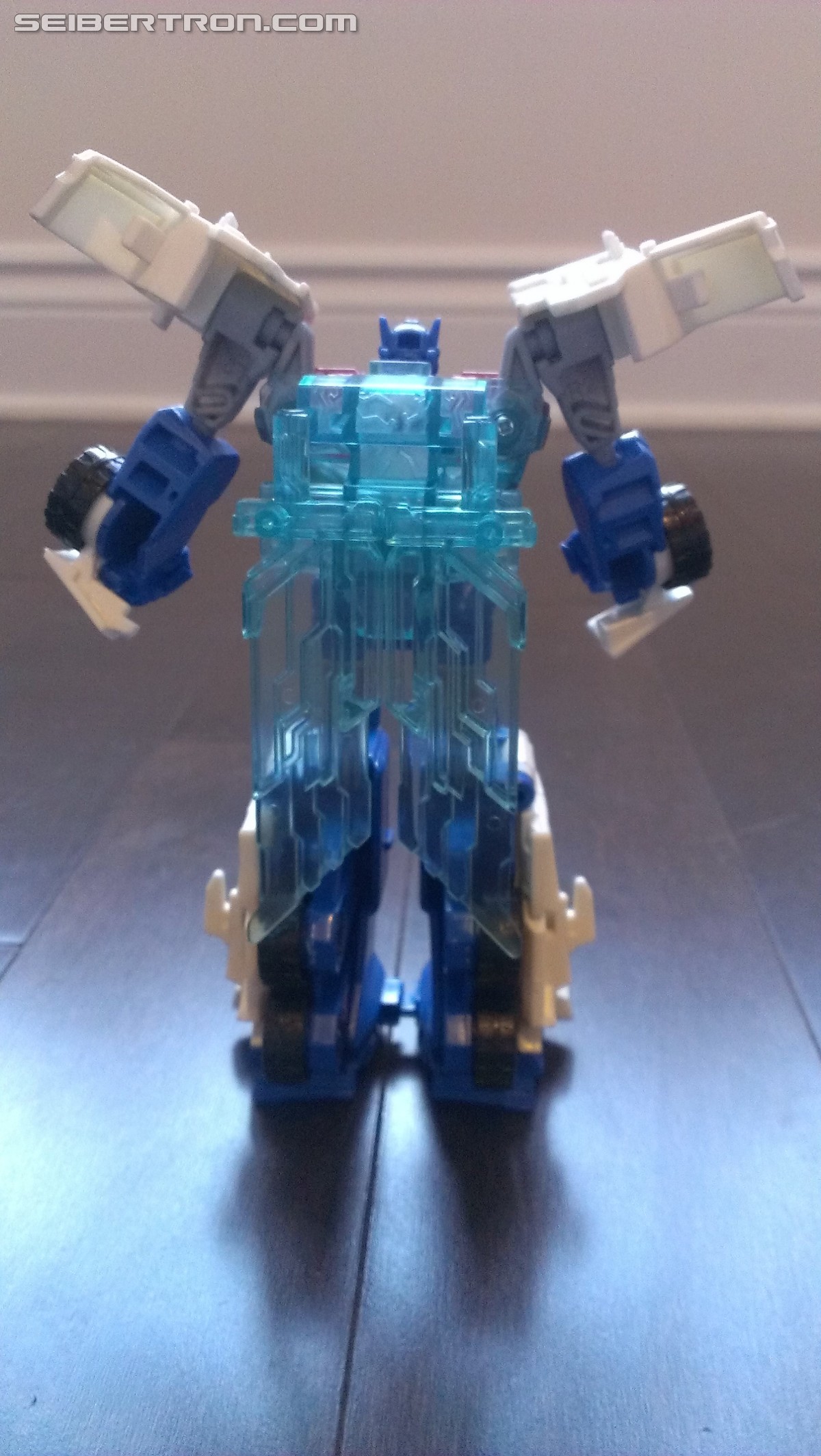 Transformers News: In Hand Pictures of TRU Exclusive White Redeco of Transformers RID Power Surge Optimus Prime Warrior