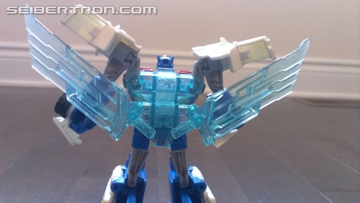 Transformers News: In Hand Pictures of TRU Exclusive White Redeco of Transformers RID Power Surge Optimus Prime Warrior