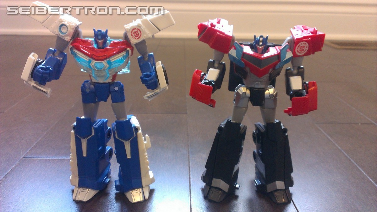 Transformers News: In Hand Pictures of TRU Exclusive White Redeco of Transformers RID Power Surge Optimus Prime Warrior