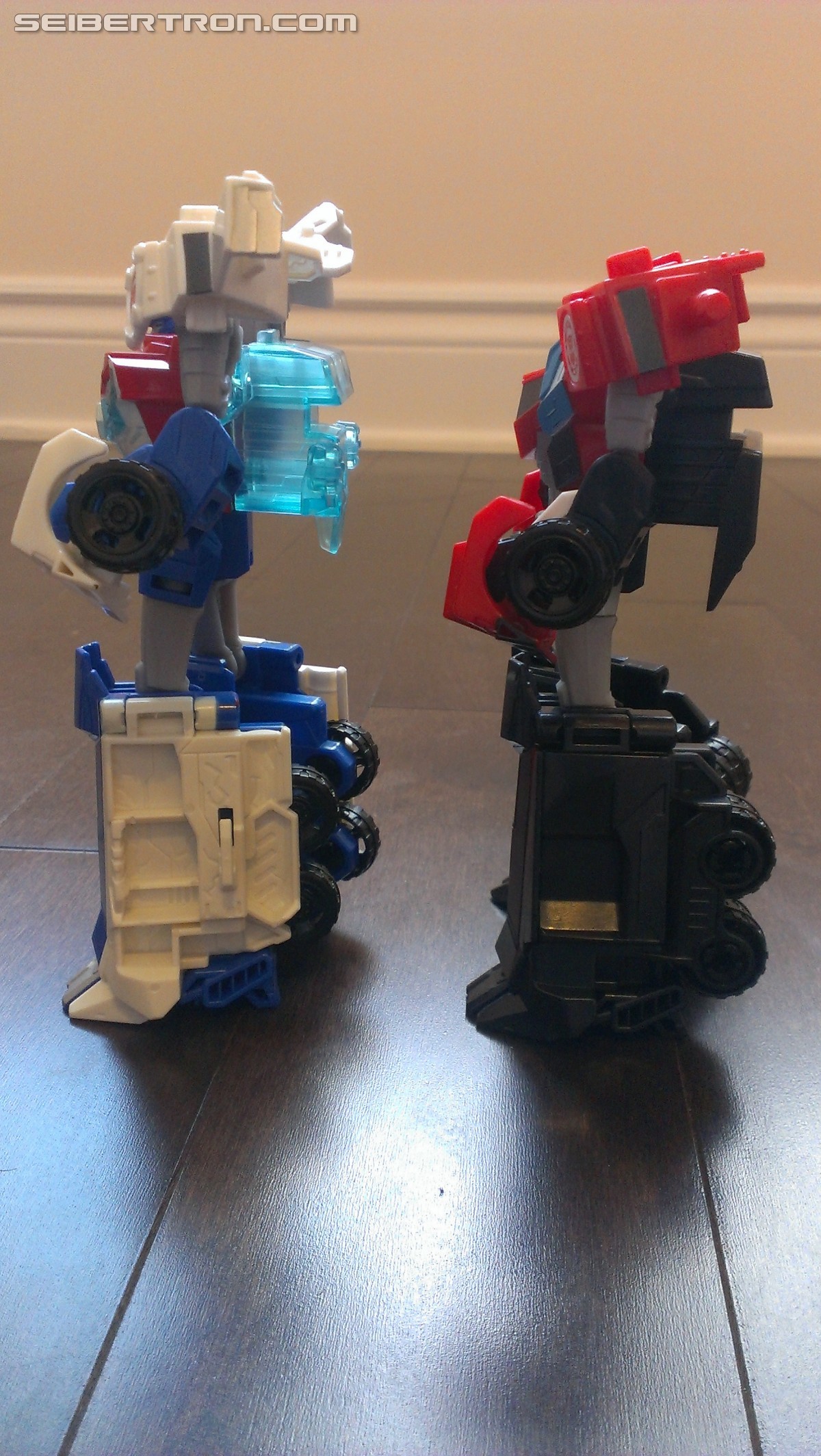 Transformers News: In Hand Pictures of TRU Exclusive White Redeco of Transformers RID Power Surge Optimus Prime Warrior
