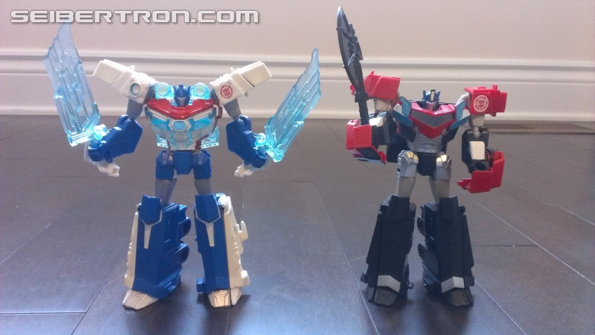 Transformers News: In Hand Pictures of TRU Exclusive White Redeco of Transformers RID Power Surge Optimus Prime Warrior