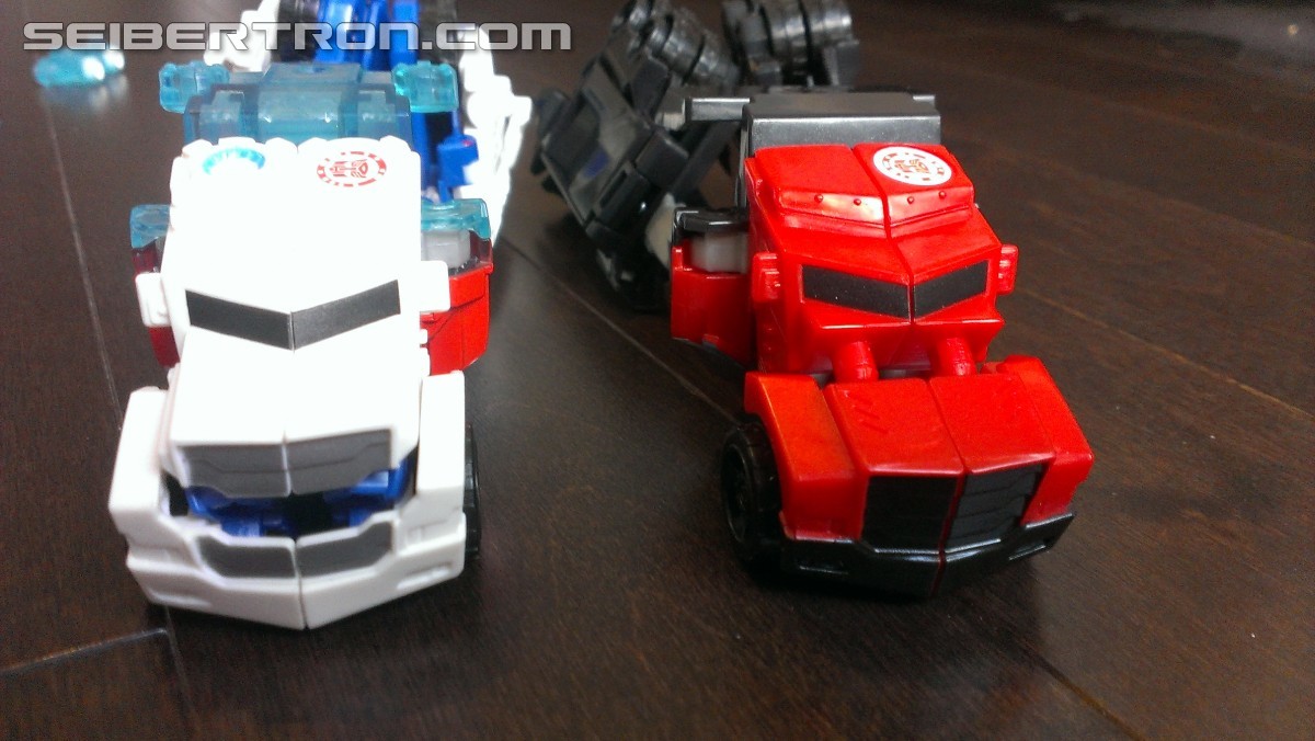 Transformers News: In Hand Pictures of TRU Exclusive White Redeco of Transformers RID Power Surge Optimus Prime Warrior