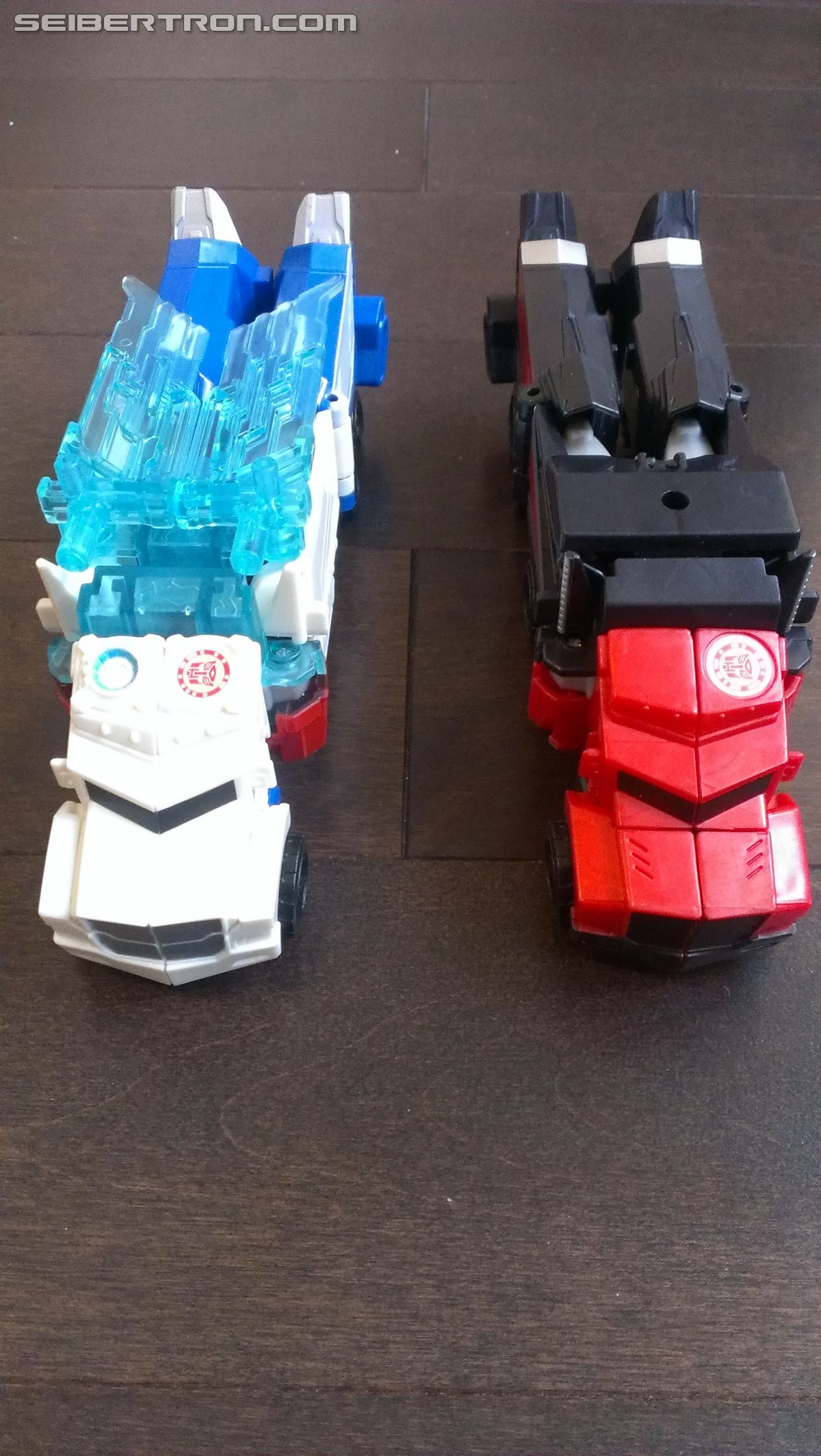 Transformers News: In Hand Pictures of TRU Exclusive White Redeco of Transformers RID Power Surge Optimus Prime Warrior