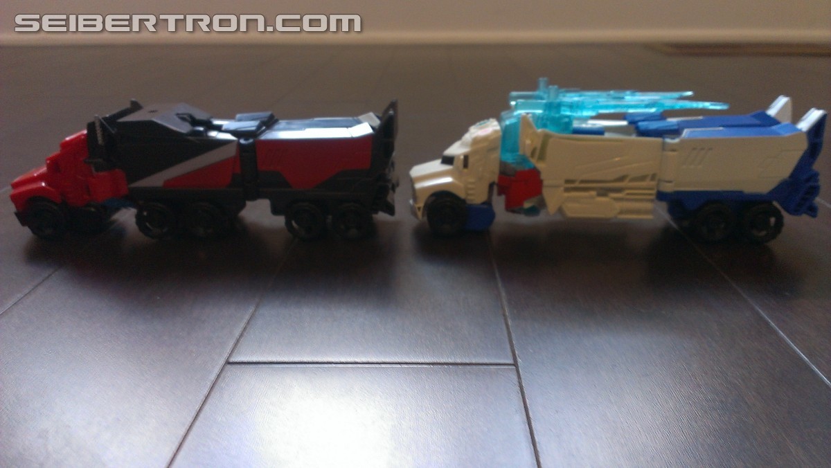 Transformers News: In Hand Pictures of TRU Exclusive White Redeco of Transformers RID Power Surge Optimus Prime Warrior