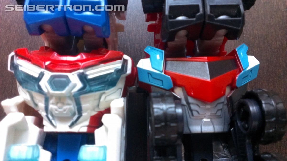 Transformers News: In Hand Pictures of TRU Exclusive White Redeco of Transformers RID Power Surge Optimus Prime Warrior