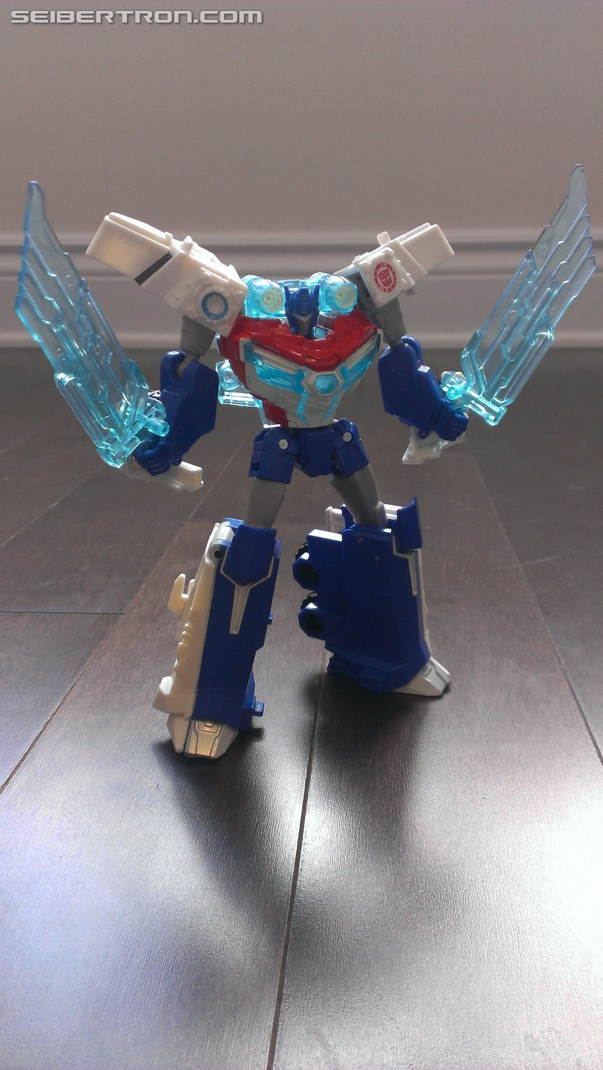 Transformers News: In Hand Pictures of TRU Exclusive White Redeco of Transformers RID Power Surge Optimus Prime Warrior