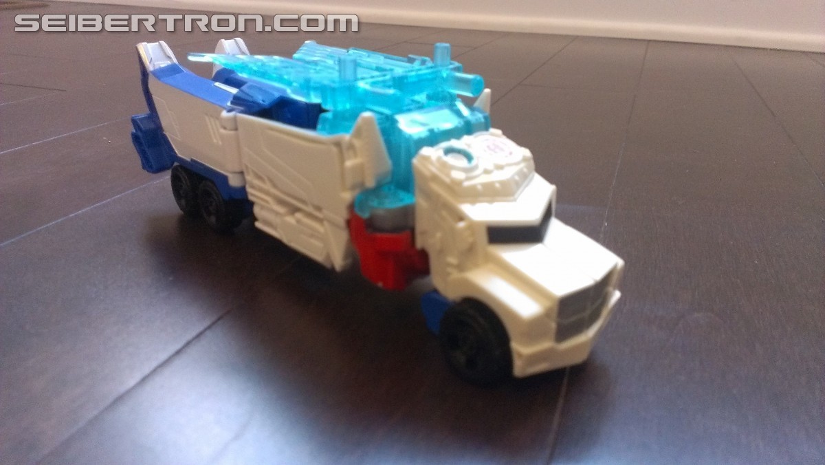 Transformers News: In Hand Pictures of TRU Exclusive White Redeco of Transformers RID Power Surge Optimus Prime Warrior