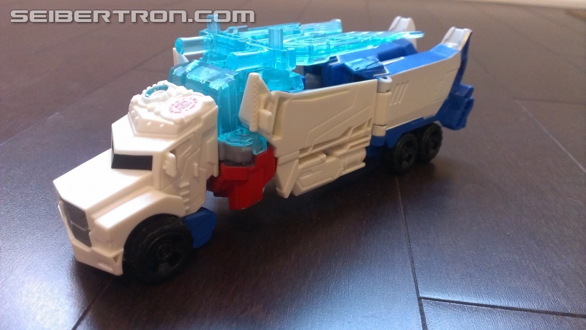 Transformers News: In Hand Pictures of TRU Exclusive White Redeco of Transformers RID Power Surge Optimus Prime Warrior
