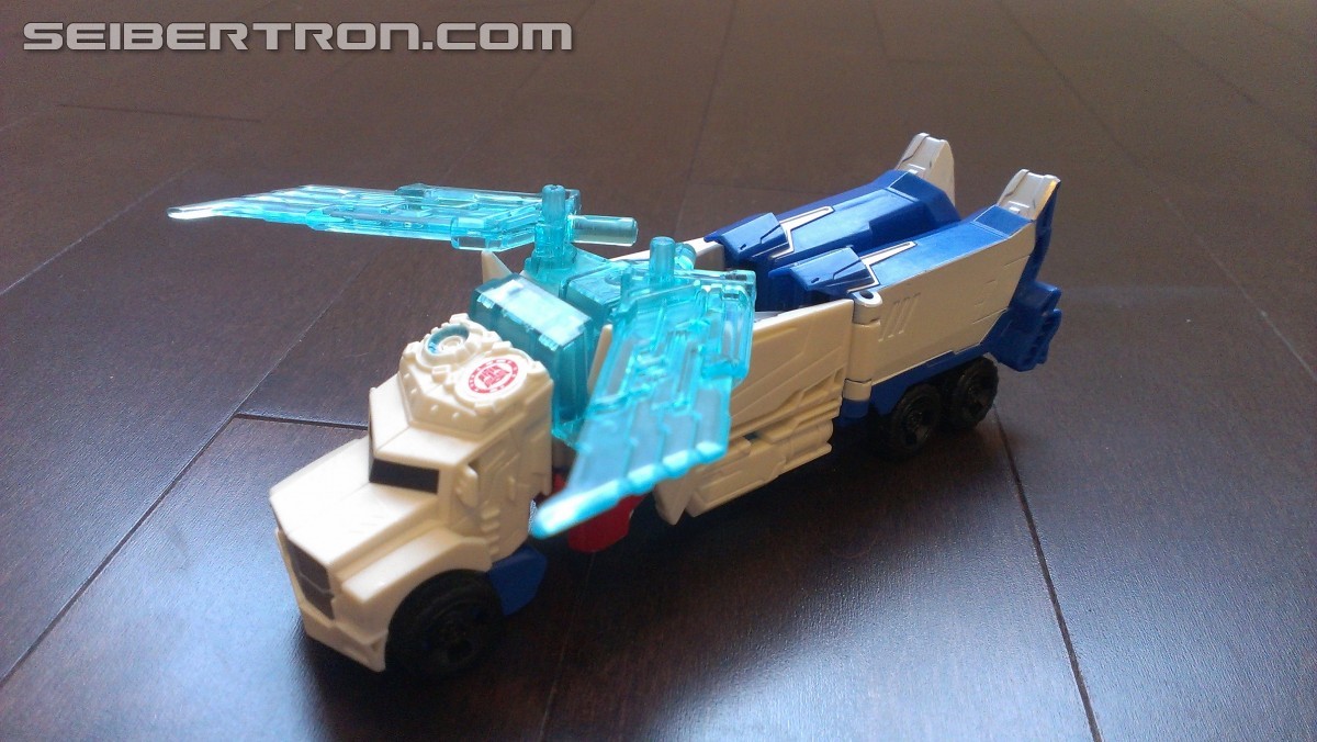 Transformers News: In Hand Pictures of TRU Exclusive White Redeco of Transformers RID Power Surge Optimus Prime Warrior