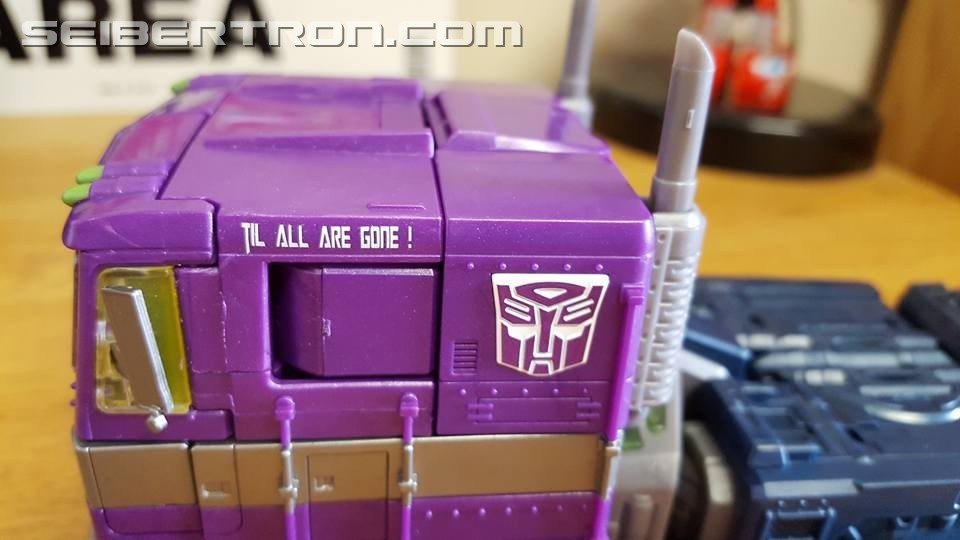 Transformers News: Masterpiece Shattered Glass Optimus Prime Review