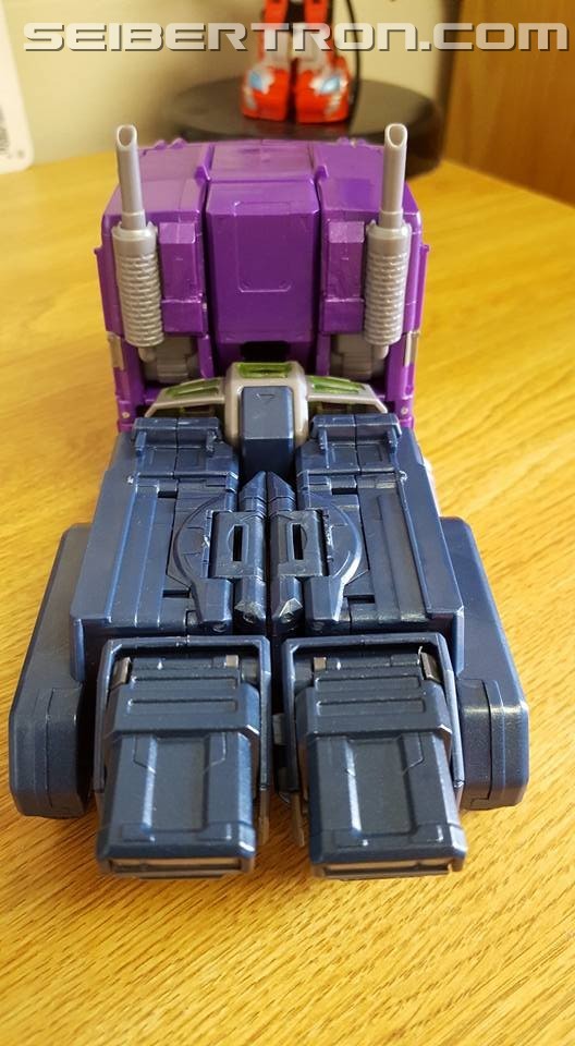 Transformers News: Masterpiece Shattered Glass Optimus Prime Review