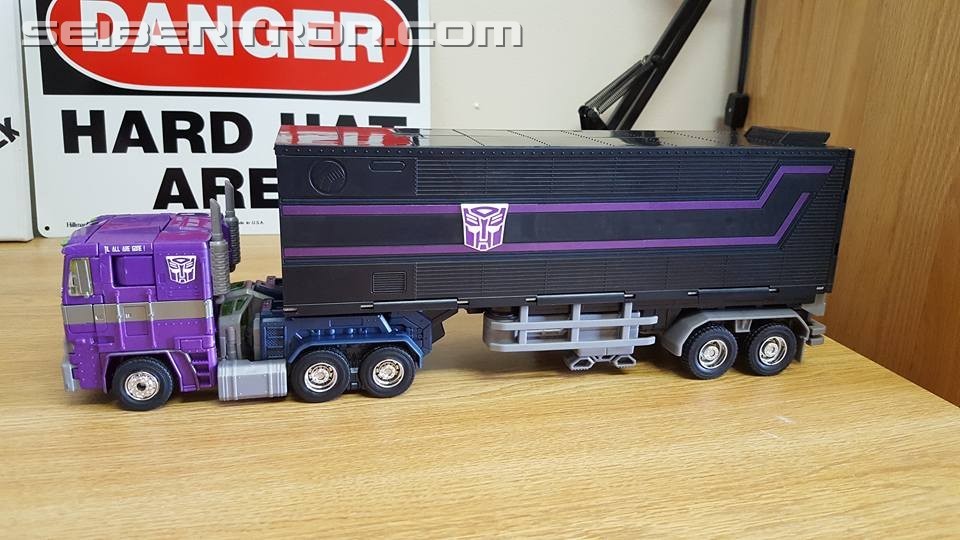 Transformers News: Masterpiece Shattered Glass Optimus Prime Review