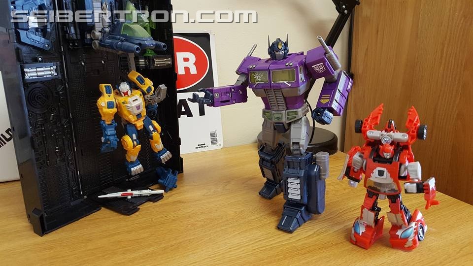Transformers News: Masterpiece Shattered Glass Optimus Prime Review