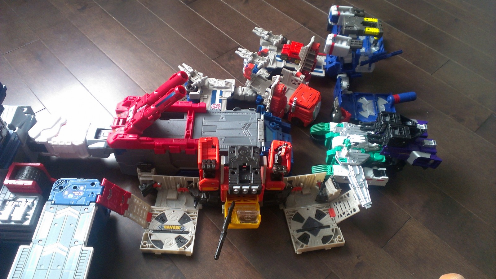 Transformers News: Connecting all the Titans Return Bases So Far