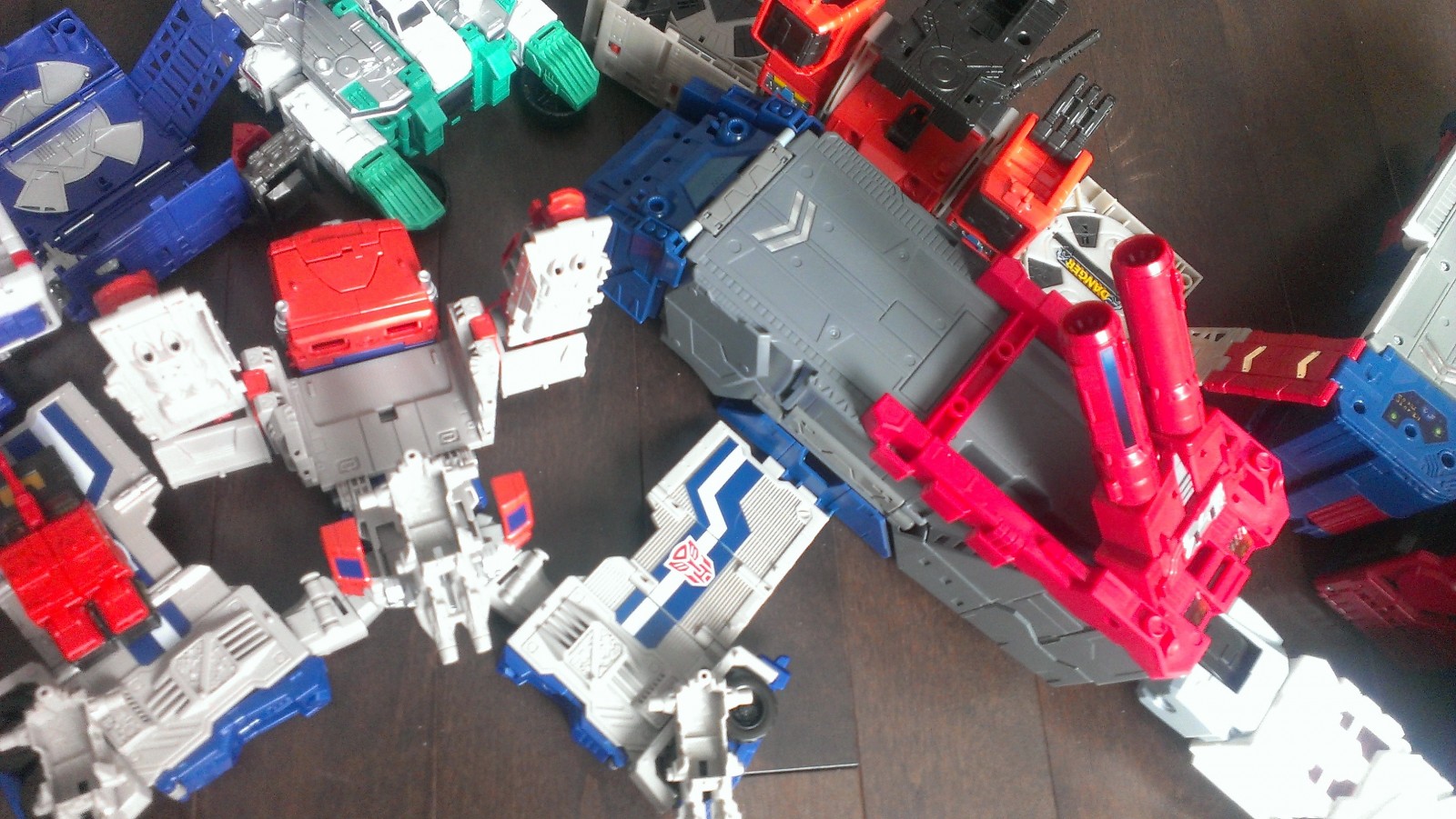Transformers News: Connecting all the Titans Return Bases So Far