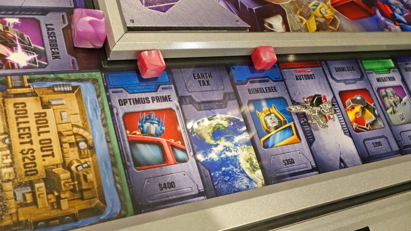 Transformers News: Promo Images of Winning Solutions Premium Transformers Monopoly