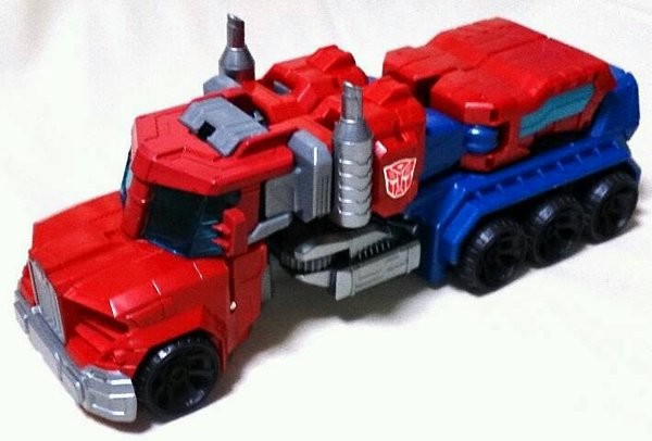 Transformers News: Transformers Generations Cyber Series Line Optimus Prime Comparison Images