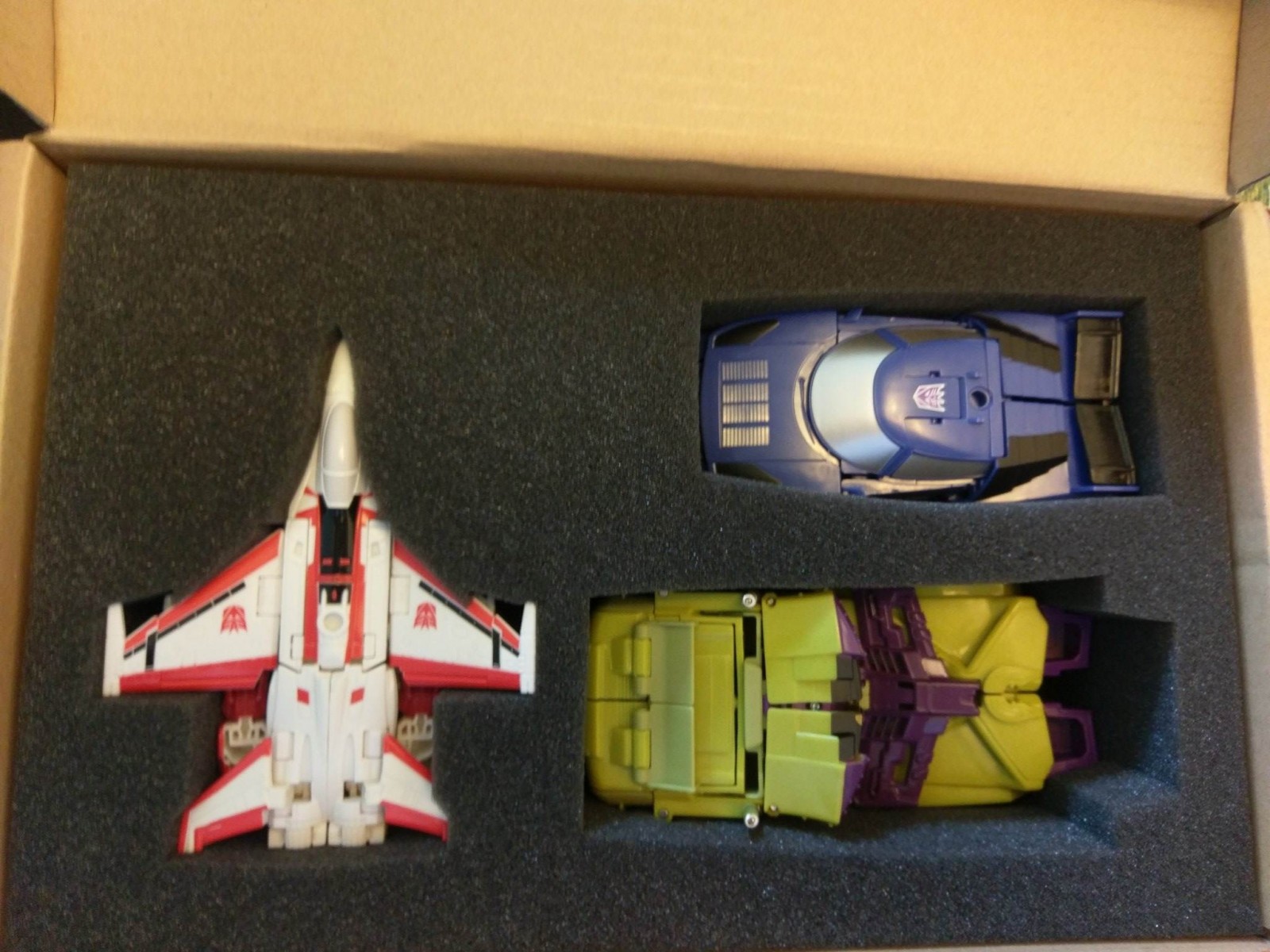 Transformers News: In hand Images of TFSS Shattered Glass Starscream, Toxitron and Counterpunch